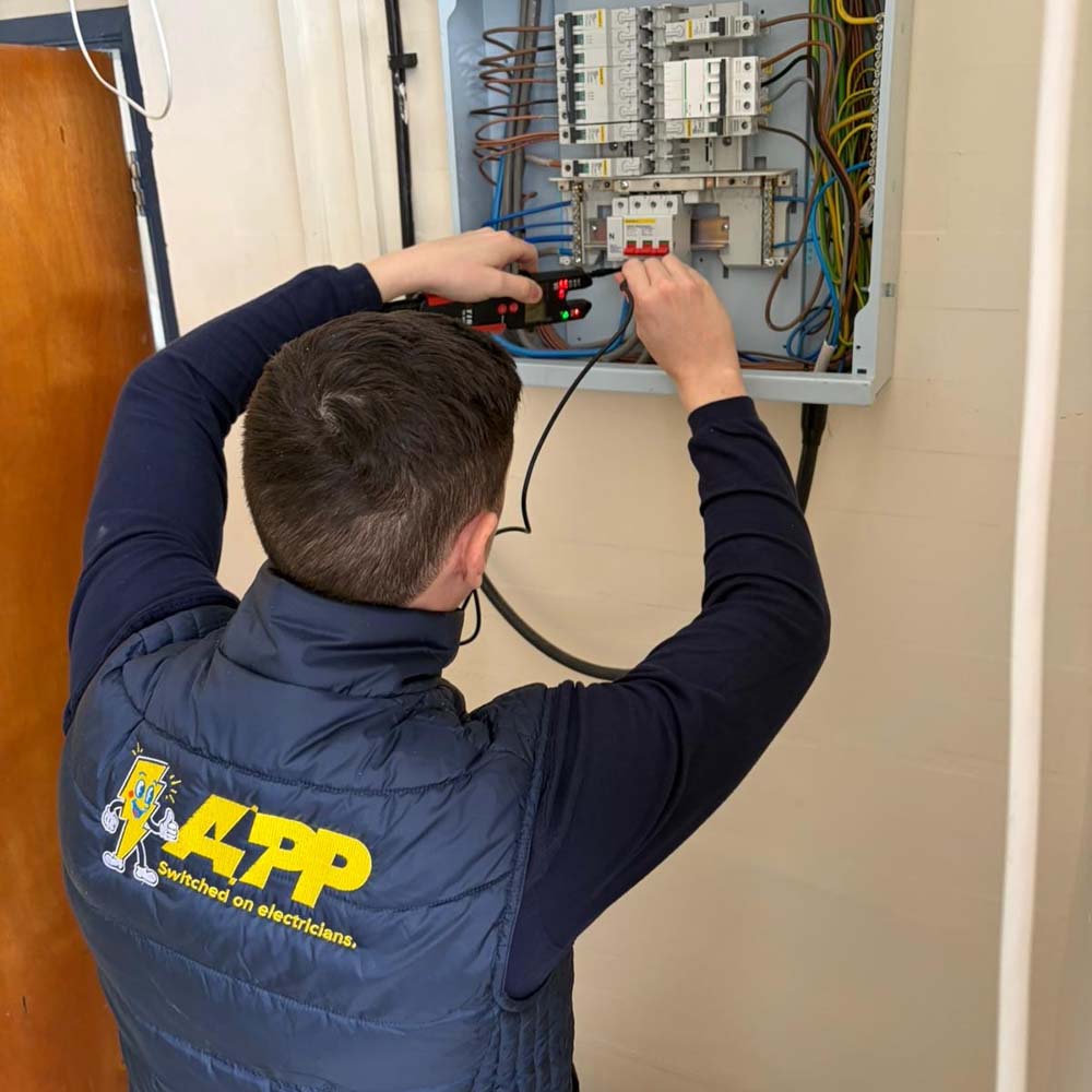 APP Electrical team member repairing a MRXBOX MVHR system inside a domestic property.