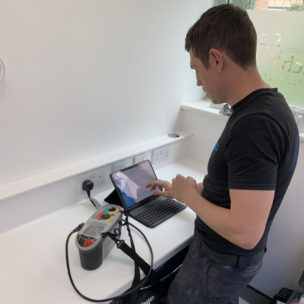 Andrew from APP Electrical conducting EICR for a cardiff homeowner in south wales.