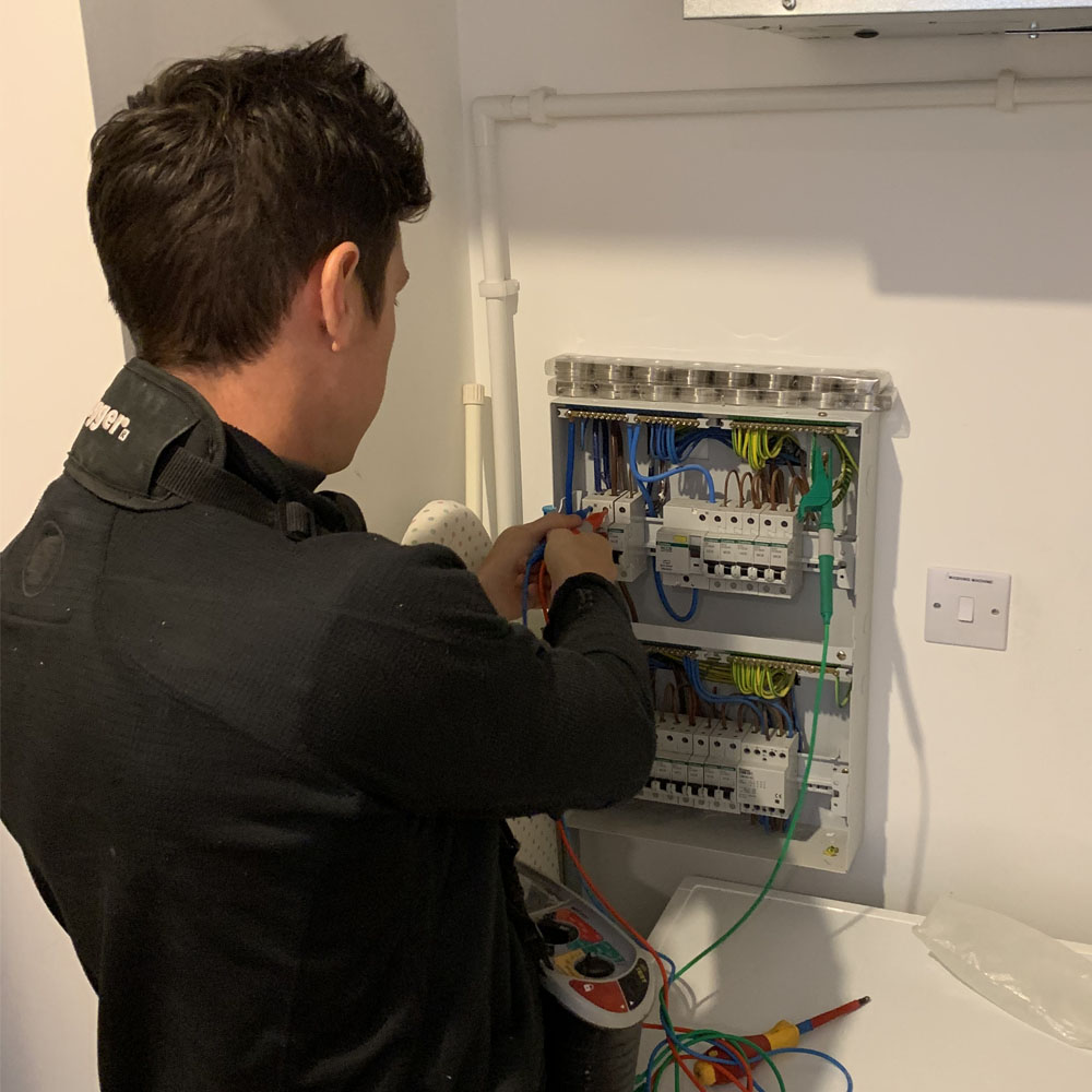 APP Electrical team member carrying out emergency electrical works inside of cardiff home.